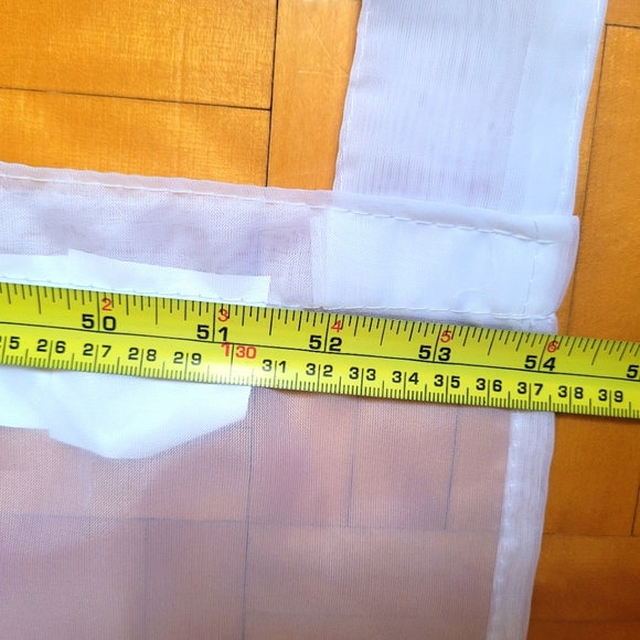 Two white and transparent curtains . - Picture 3 of 7